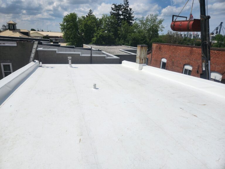 Low-Slope Metal Roof Overlay w/ Duro-Last, captured on May 16, 2024 with CompanyCam.