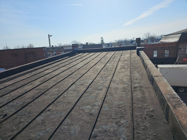 Low-Slope Metal Roof Overlay w/ Duro-Last, captured on Apr 09, 2024 with CompanyCam.