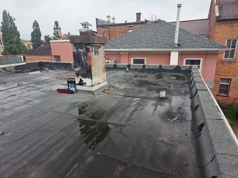 4-Plex Apartment Building Flat Roof Replacement , captured on Jul 15, 2024 with CompanyCam.