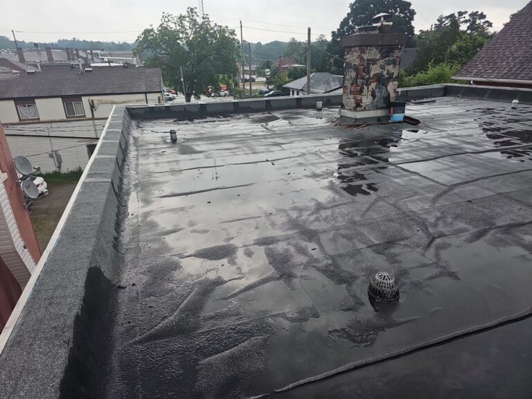 4-Plex Apartment Building Flat Roof Replacement , captured on Jul 15, 2024 with CompanyCam.