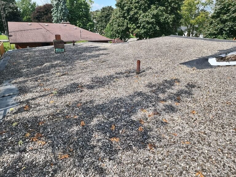 Stone Covered EPDM Roof Replacement with PVC Roofing, captured on Sep 18, 2023 with CompanyCam.