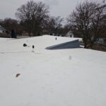 Stone Covered EPDM Roof Replacement with PVC Roofing, captured on Jan 10, 2025 with CompanyCam.