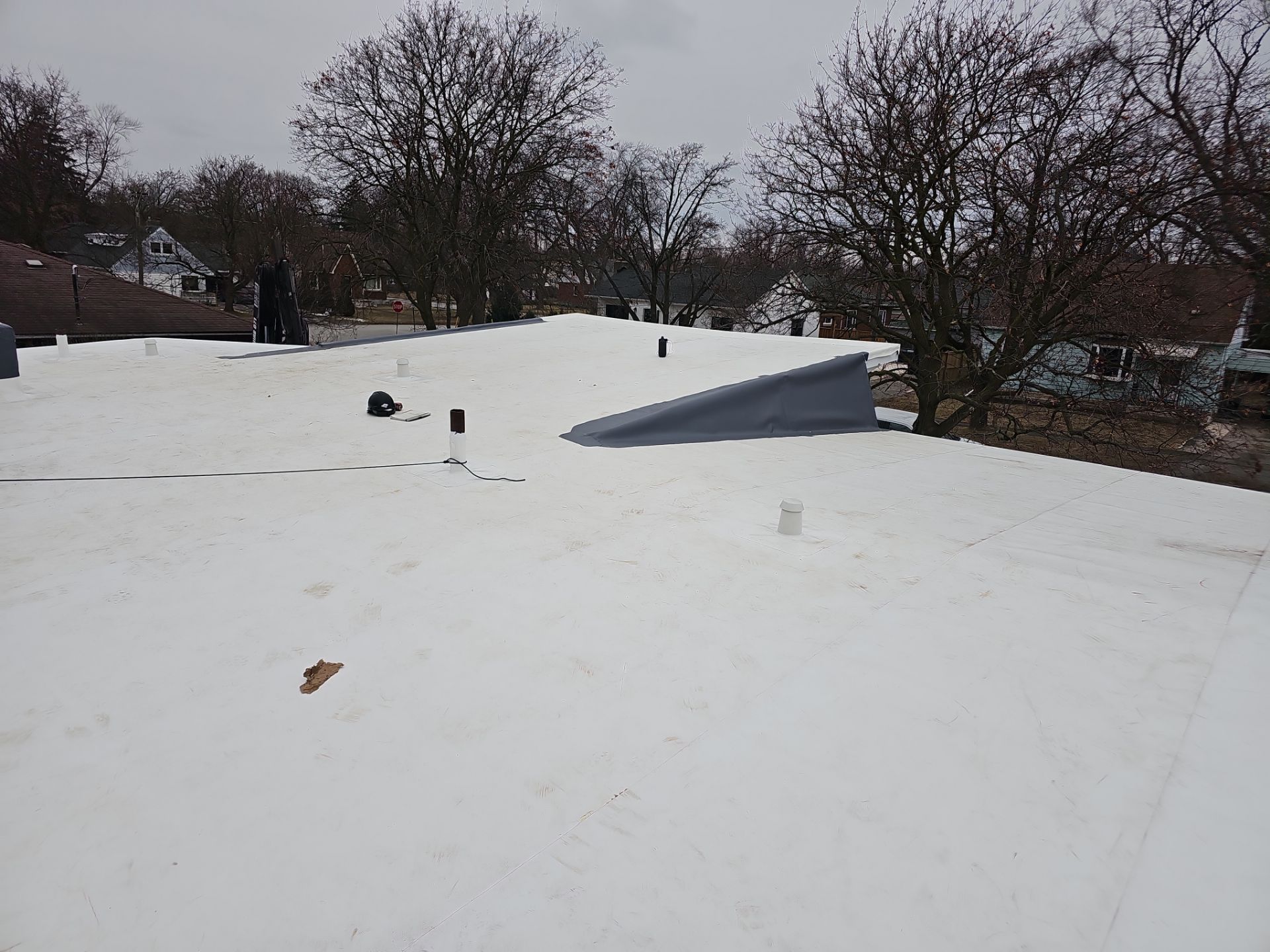 Stone Covered EPDM Roof Replacement with PVC Roofing, captured on Jan 10, 2025 with CompanyCam.