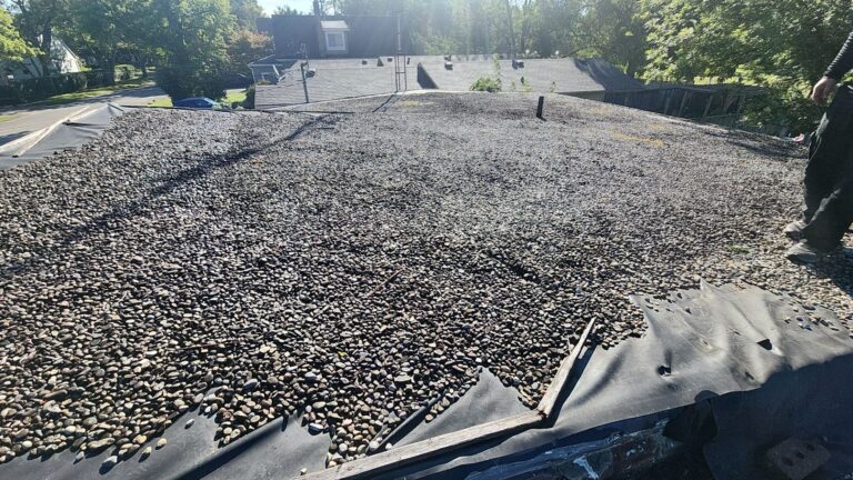 Stone Covered EPDM Roof Replacement with PVC Roofing, captured on Sep 10, 2024 with CompanyCam.