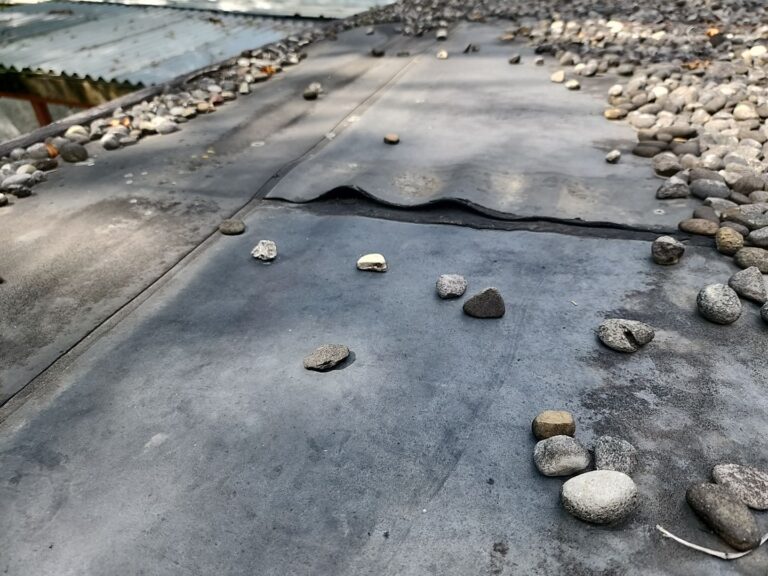 Stone Covered EPDM Roof Replacement with PVC Roofing, captured on Sep 18, 2023 with CompanyCam.