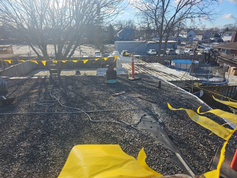 Stone Covered EPDM Roof Replacement with PVC Roofing, captured on Jan 08, 2025 with CompanyCam.