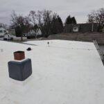 Stone Covered EPDM Roof Replacement with PVC Roofing, captured on Jan 10, 2025 with CompanyCam.