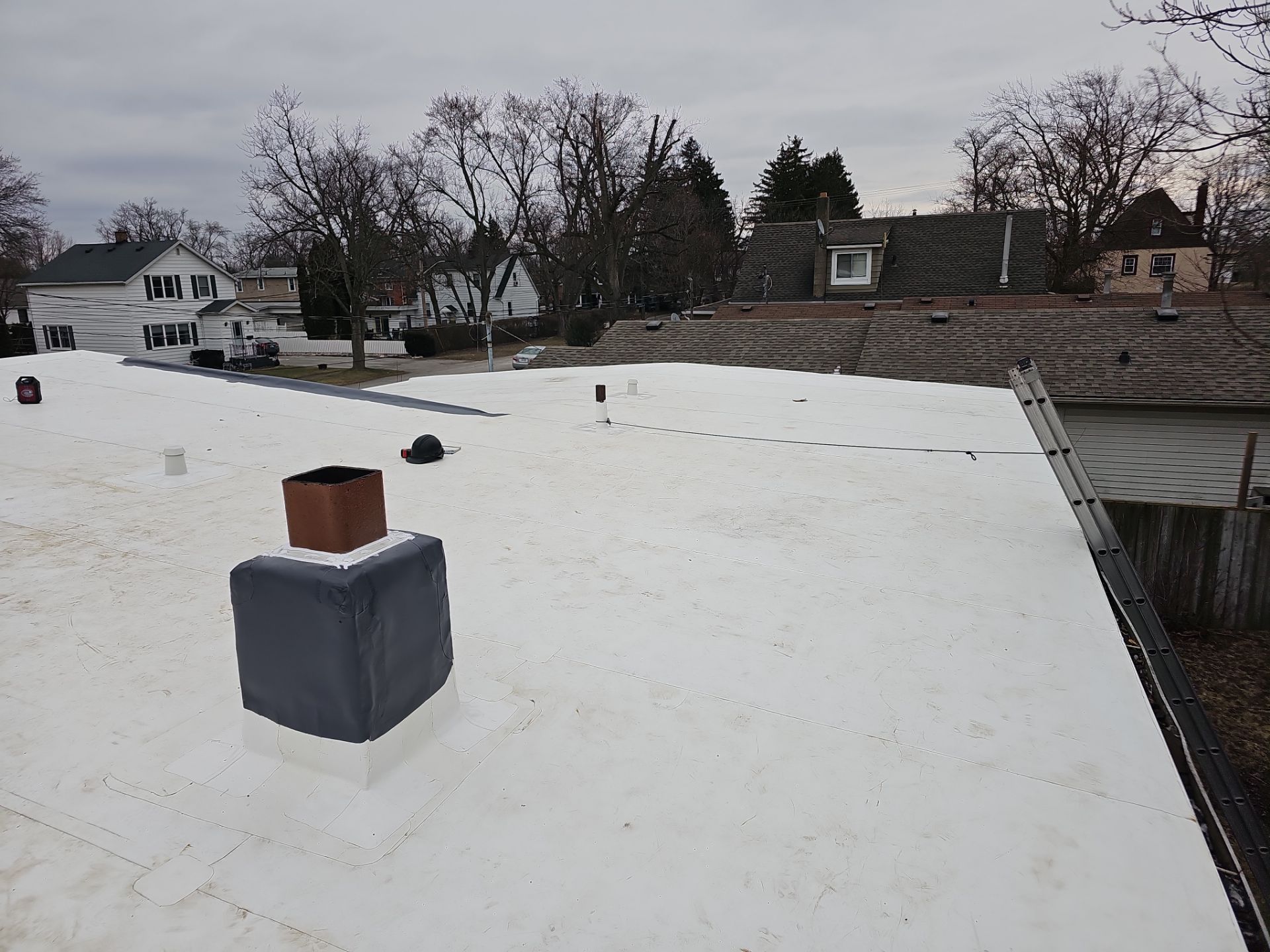 Stone Covered EPDM Roof Replacement with PVC Roofing, captured on Jan 10, 2025 with CompanyCam.
