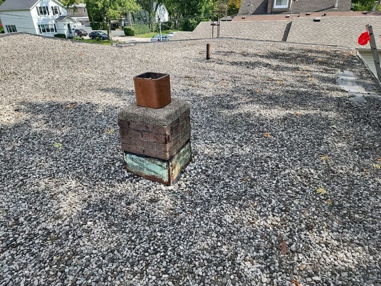 Stone Covered EPDM Roof Replacement with PVC Roofing, captured on Sep 18, 2023 with CompanyCam.